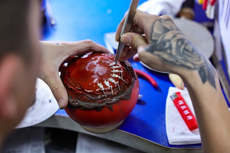 Applying enamel and plating on custom jewelry