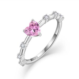 Pink silver moissanite ring showing exceptional brilliance, a great alternative to diamonds