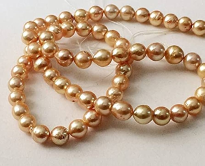 Golden South Sea pearl necklace with lustrous yellow tones.