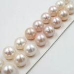 An array of different pearl types and shapes, showcasing natural and cultured pearls for a comprehensive guide.