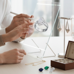 High-tech custom diamond ring design on holographic display in modern city-view studio.