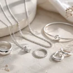 Elegant sterling silver jewelry collection featuring rings necklace bracelet and earrings