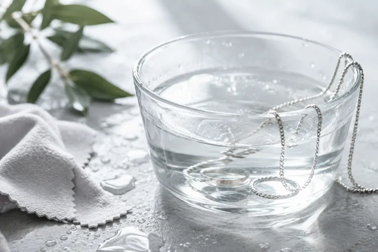 Sterling silver jewelry submerged in water for a guide about whether silver tarnishes in water.