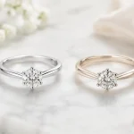 White gold and silver rings side by side showing the difference in color and appearance