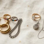 Costume jewelry vs fine jewelry comparison flat lay showing costume pieces and fine jewelry side by side